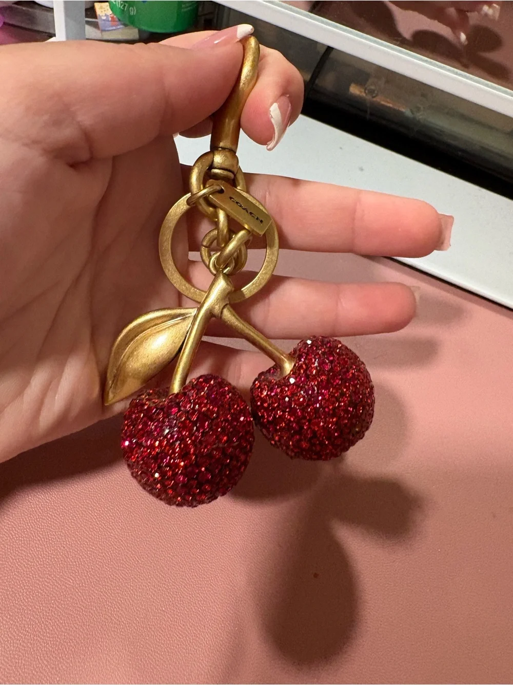 Coach Gold-Tone Cherry Charm Keychain with Red Crystals